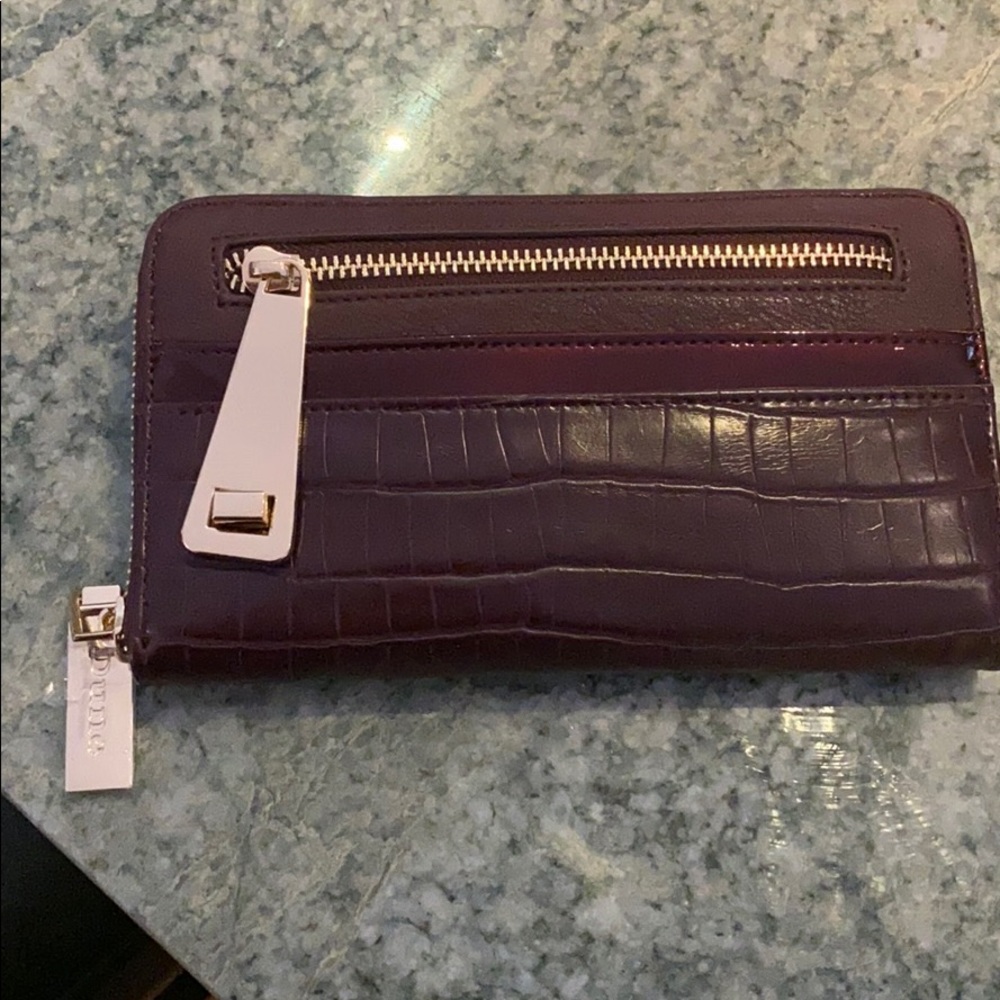 Brand new never been used merlot colored wallet